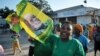 Supporter of the ruling CCM party in Tanzania celebrate after the party’s presidential candidate, John Pombe Magufuli was declared a winner, in Dar es Salaam, Tanzania, Oct. 29, 2015.