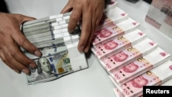 Mata uang China, yuan, menurun tajam ke tingkat terendah dalam 11 tahun, Senin, 5 Agustus 2019. (Foto: ilustrasi).