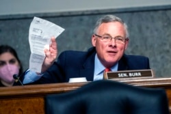 FILE - Sen. Richard Burr, R-N.C., speaks on Capitol Hill in Washington, Jan. 11, 2022.