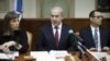 Israeli Prime Minister Benjamin Netanyahu, center, heads the weekly Cabinet meeting in his Jerusalem office, January 6, 2013.