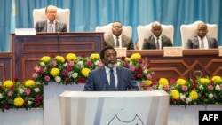 Le président de la République démocratique du Congo, Joseph Kabila, prononce un discours sur l'état de la nation au parlement à Kinshasa le 19 juillet 2018. 