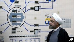 FILE - President Hassan Rouhani visits the Bushehr nuclear power plant just outside the port city of Bushehr, Iran, Jan. 13, 2015, in this photo released by the Iranian Presidency Office.