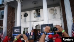 FILE - U.S. President Donald Trump delivers remarks to the City of New York Police Benevolent Association at Trump National Golf Club in Bedminster, New Jersey, Aug. 14, 2020. 