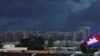 FILE: Buildings under construction are pictured beneath dark clouds in Phnom Penh, Cambodia, June 18, 2018.