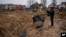 Ukraina dahshat ichra: Urushni yoritayotgan jurnalistlar 
