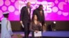 Denmark's Minister for Development Cooperation Rasmus Prehn, left, Crown Princess Mary of Denmark, center, and Kenya's President Uhuru Kenyatta, right, attend the International Conference on Population and Development summit in Nairobi, Nov. 12, 2019.