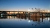 Fishing boats are docked late in the evening on the Mississippi River in Empire, Louisiana, on Oct. 16, 2023.
