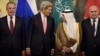 From left, Russian Foreign Minister Sergei Lavrov, Secretary of State John Kerry, Saudi Foreign Minister Adel al-Jubeir and Turkish Foreign Minister Feridun Sinirlioglu stand together before a meeting in Vienna, Austria, Oct. 29, 2015.