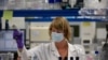 A lab technician works during research on coronavirus, COVID-19, at Johnson & Johnson subsidiary Janssen Pharmaceutical in Beerse, Belgium, June 17, 2020. 