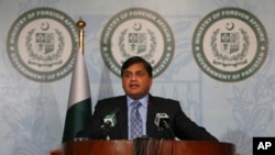 FILE - Pakistan's Foreign Ministry spokesman Mohammad Faisal briefs journalists in Islamabad, Pakistan, Feb. 4, 2018.