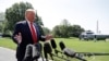 FILE - President Donald Trump talks to reporters on the South Lawn of the White House, July 5, 2019, in Washington. 