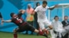 Germany's Mats Hummels, left, and United States' Fabian Johnson challenge for the ball during the group G World Cup soccer match between the USA and Germany at the Arena Pernambuco in Recife, Brazil, June 26, 2014. 