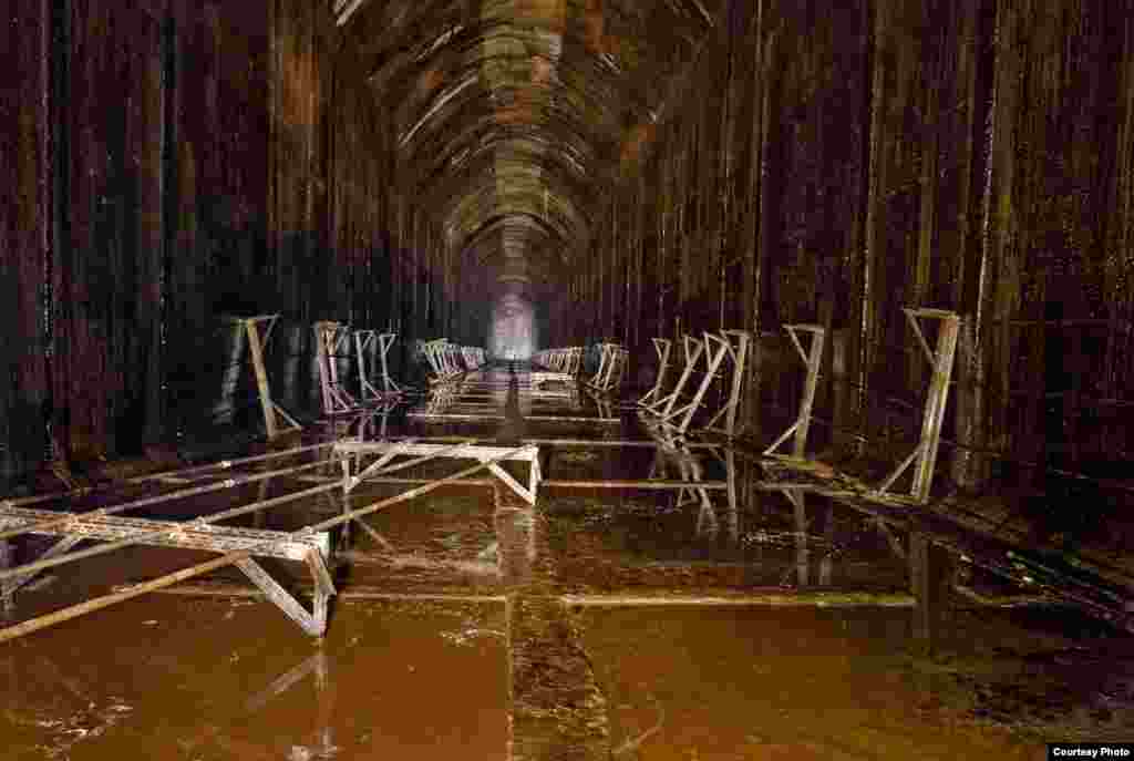 The World War II abandoned oil storage tanks in Inchindown, Scotland was the test site for the world’s longest echo. (RCAHMS)