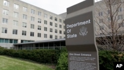Kantor Departemen Luar Negeri AS di Washington, D.C., 15 Desember 2014. (AP Photo/Luis M. Alvarez)
