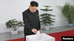 North Korean leader Kim Jong Un visits the Kim Il Sung University of Politics to take part in the election of a deputy to the Supreme People's Assembly at sub-constituency No. 43 of Constituency No. 105 together with service personnel of the KPA, Mar. 9, 