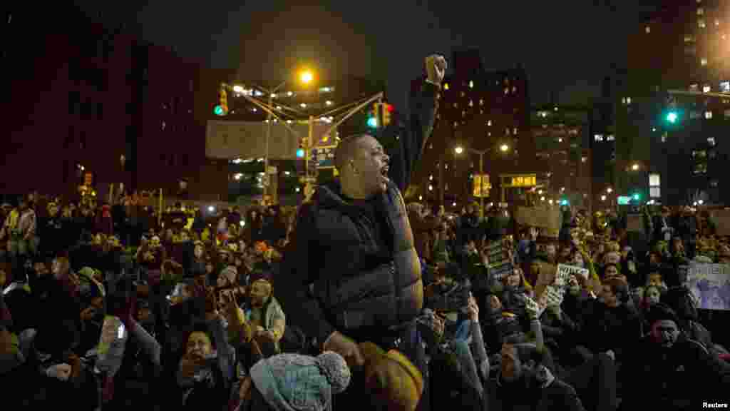 Protesters gather in Manhattan as thousands take to the streets of New York demanding justice for the death of Eric Garner, Dec. 5, 2014.