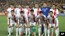2015年1月22日澳大利亚布里斯班： 中国足球队在亚足联四分之一决赛前留影。