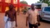Injured policemen are seen outside Shehu's Palace of Bama, Borno State, Nigeria. May 7, 2013.
