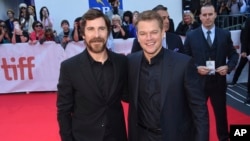 Christian Bale (izquierda) y Matt Damon en el estreno de "Ford v Ferrari" en el quinto día del Festival Internacional de Cine de Toronto en Roy Thomson Hall. Toronto, Canadá, 9/9/19.
