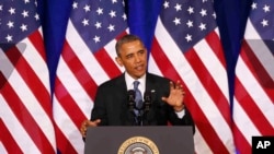 Presiden Obama berbicara tentang NSA, Jumat (17/1/2014) di Departemen Kehakiman, Washington DC. Presiden menghimbau dihentikannya kontrol pemerintah atas pengumpulan data panggilan telepon orang Amerika. 