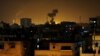 Smoke rises after an Israeli missile strike in Beit Lahia, northern Gaza Strip, July 7, 2014.