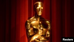 FILE - An Oscar statue is seen during the nominations announcements for the 88th Academy Awards in Beverly Hills, California, Jan. 14, 2016.