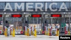 FILE - The U.S.-Canada border crossing is seen amid the coronavirus outbreak in Lacolle, Quebec, Canada, April 17, 2020.