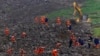 Rescuers recover 1 body and search for 28 people in a landslide in southwest China