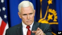 Indiana Gov. Mike Pence takes a question during a news conference in Indianapolis, March 31, 2015.