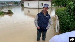 Poplave u Doboju, 14. maj 2019. (AP Photo/Eldar Emric)