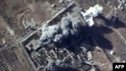 A video grab made on October 12, 2015, shows an image taken from footage made available on the Russian Defense Ministry's website, purporting to show explosions after airstrikes carried out by Russian jets on what Moscow says was an Islamic State target.