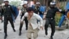 Vendor Killed as Protesters Clash With Police