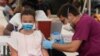 US COVID-19 Cases Hit Six-Month High at Over 100,000