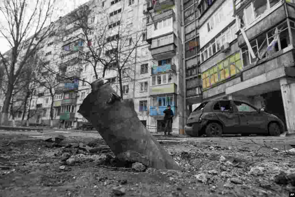 A piece of an exploded Grad missile outside an apartment building in Vostochniy, Mariupol, Ukraine, Jan. 25, 2015.