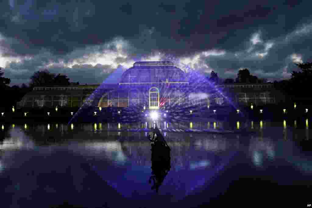 The Palm House is illuminated during the launch of "Christmas at Kew" at the Kew Royal Botanic Gardens in London.