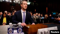 Facebook CEO Mark Zuckerberg arrives to testify before a Senate Judiciary and Commerce Committees joint hearing regarding the company’s use and protection of user data, on Capitol Hill in Washington, April 10, 2018.