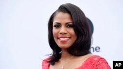 FILE - Omarosa Manigault poses at The Hollywood Reporter's 25th Annual Women in Entertainment Breakfast, Dec. 7, 2016, in Los Angeles. 