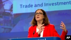 FILE - European Commissioner for Trade Cecilia Malmstroem speaks during a media conference at EU headquarters in Brussels, Tuesday, June 26, 2018.