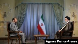 FILE - A handout picture provided by the Iranian presidency on Oct. 18, 2021 shows Iranian president Ebrahim Raisi during and interview with an Iranian TV channel.