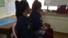 Uol Sreykhuoch, 32, and Horn Neang, 25, were in Malaysia as maids, at Adhoc headquarters in Phnom Penh on March 2, 2016, after their arrival in Cambodia. (Phorn Bopha/VOA Khmer)