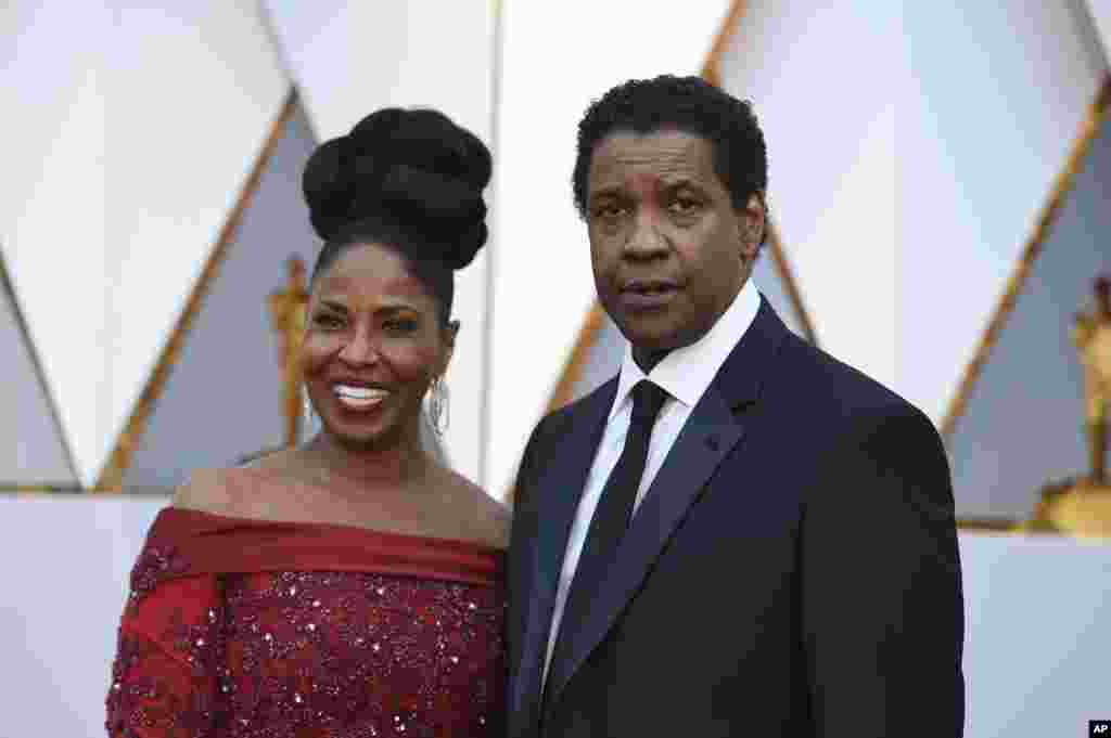 Pauletta Washington, left, and Denzel Washington arrive at the Oscars on Sunday, Feb. 26, 2017, at the Dolby Theatre in Los Angeles.