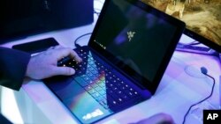 FILE - In this Jan. 7, 2016 file photo, a laptop is seen in Las Vegas.