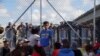 US-Mexico Bridges Reopen After Migrant Protest