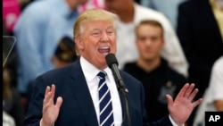 Republican presidential candidate Donald Trump speaks at a campaign rally at Open Door Christian Academy, Friday, Oct. 28, 2016, in Lisbon, Maine.