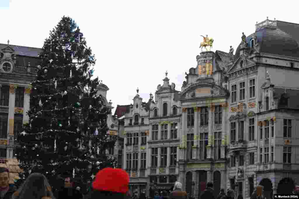 Despite terrorist fears some tourists enjoy Brussels' spectacular buildings. The heavy security presence gets as much attention from tourists as the sights.