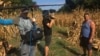 Romanian filmmaker Mihai Dragolea, center, shoots an interview for a documentary, in a photo posted on his Facebook page Sept. 28, 2021.