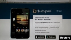 FILE - An Instagram login page is pictured on a laptop screen in Pasadena, California, Aug. 14, 2013.