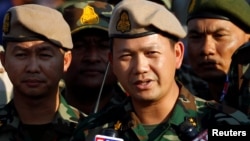 រូបឯកសារ៖ លោកនាយឧត្តមសេនីយ៍ឯក ហ៊ុន ម៉ាណែត ថ្លែងទៅកាន់អ្នកសារព័ត៌មាន នៅក្នុងអំឡុងកម្មវិធីប្រកួតកីឡាយោធាប្រចាំឆ្នាំ នៅរាជធានីភ្នំពេញ កាលពីថ្ងៃទី១១ ខែមករា ឆ្នាំ២០១៨។