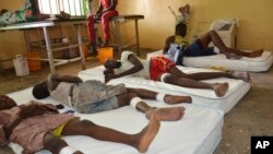 Victims receive treatment at a hospital, after an explosion in Maiduguri, Nigeria, June 17, 2015.