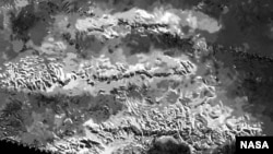 The trio of ridges on Titan known as Mithrim Montes is home to the hazy Saturnian moon's tallest peak.